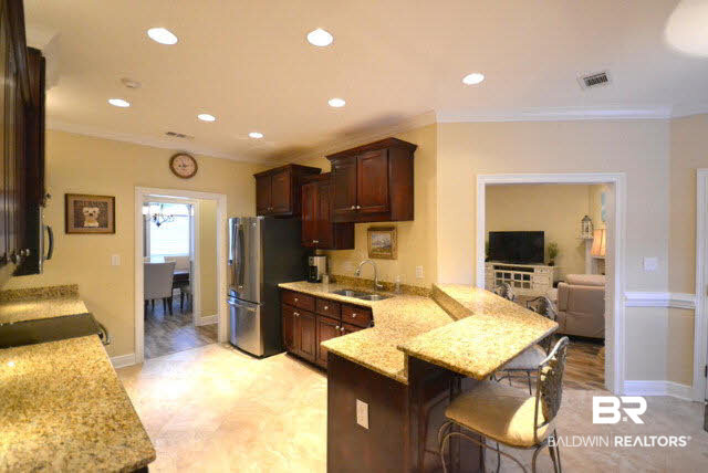 1640 Augusta Drive West Mobile, AL 36695 - Photo 8 of 25 This kitchen has lots of counter space to cook and entertain family and friends.