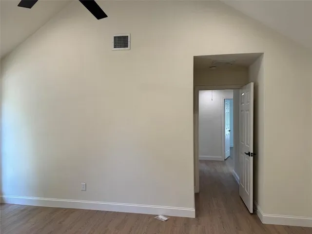 an empty room with mirror