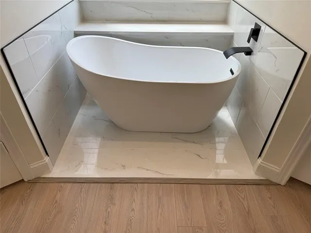 a view of a bathtub in a bathroom