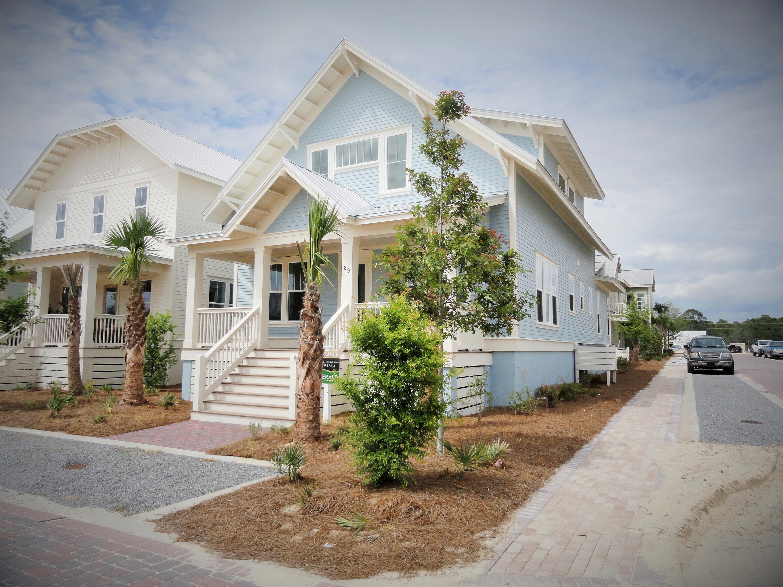 89 Clipper Street Inlet Beach, FL 32461 - Photo 1 of 50 a front view of a house with garden