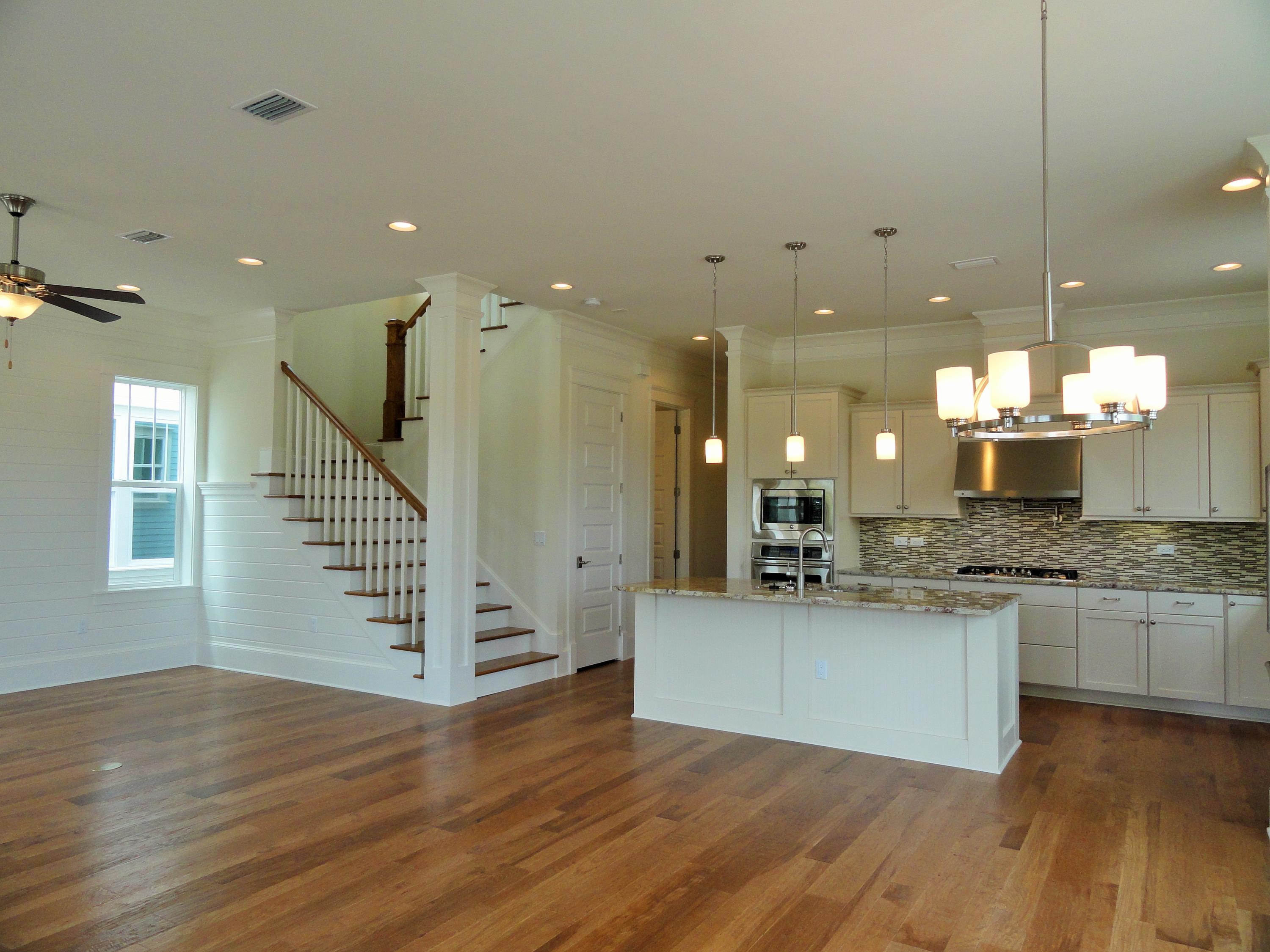89 Clipper Street Inlet Beach, FL 32461 - Photo 10 of 50 a open kitchen with stainless steel appliances granite countertop a granite counter tops and a wooden floors