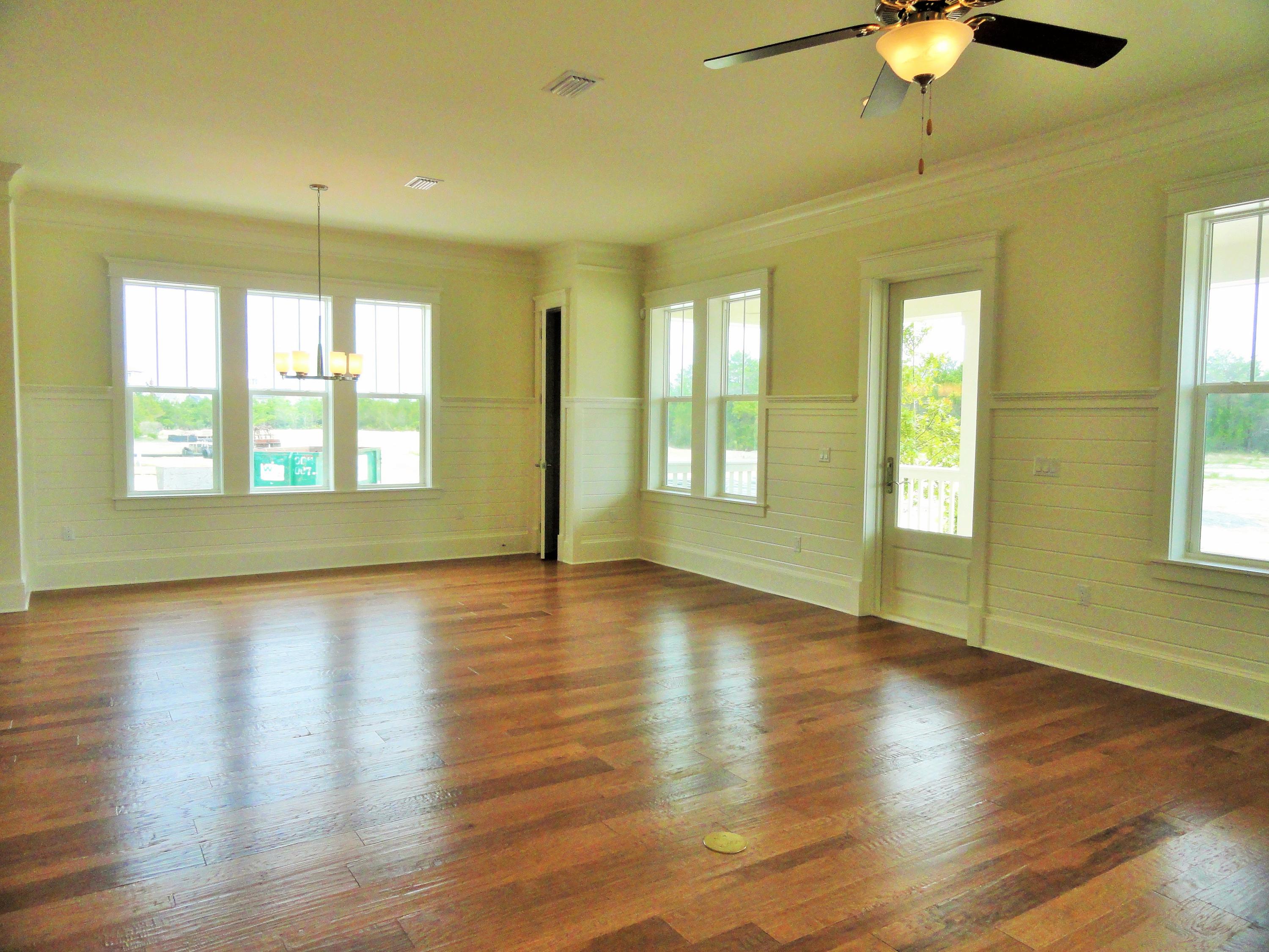 89 Clipper Street Inlet Beach, FL 32461 - Photo 12 of 50 a view of an empty room with window and wooden floor