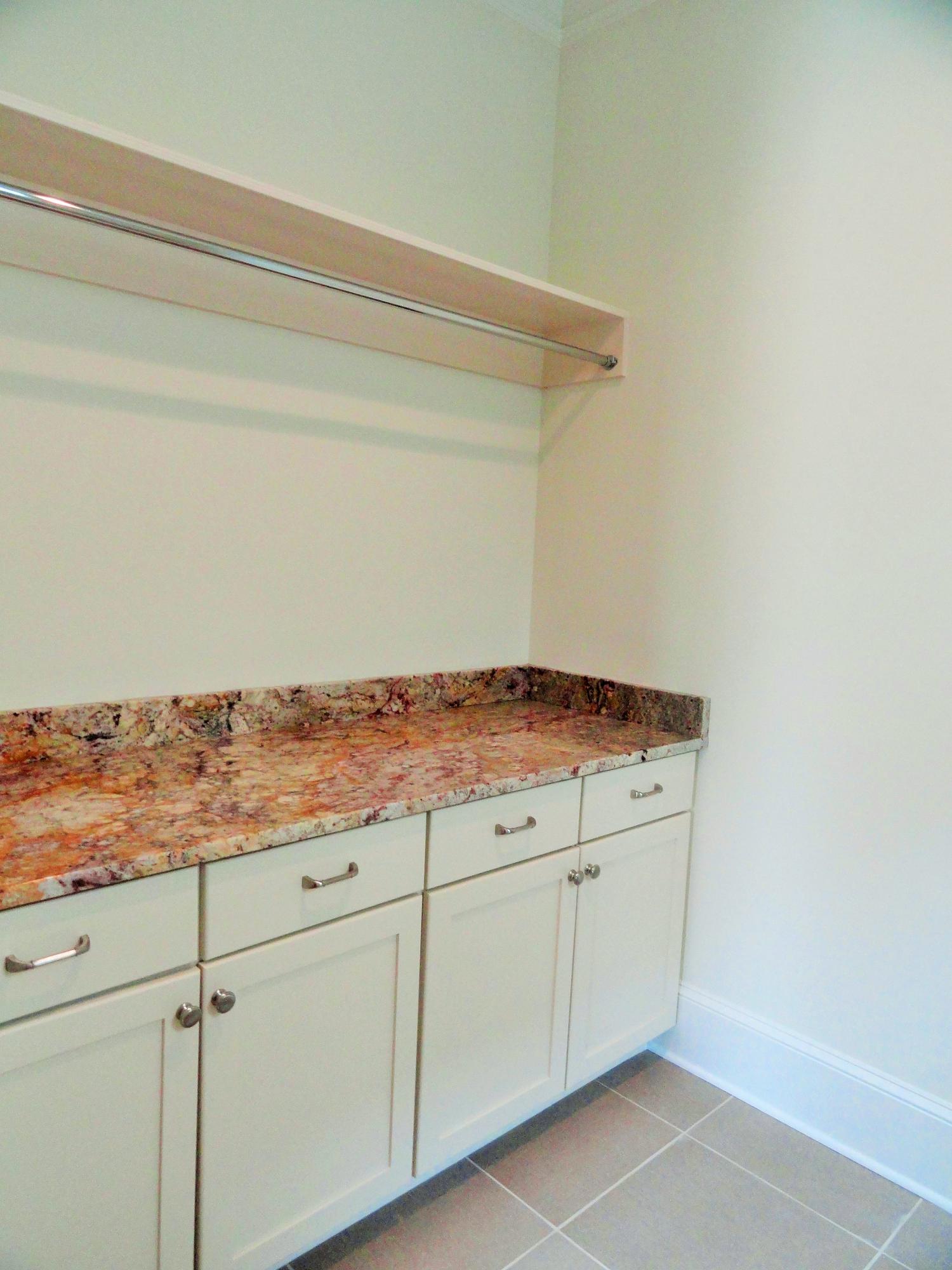89 Clipper Street Inlet Beach, FL 32461 - Photo 17 of 50 a view of a utility room with cabinets