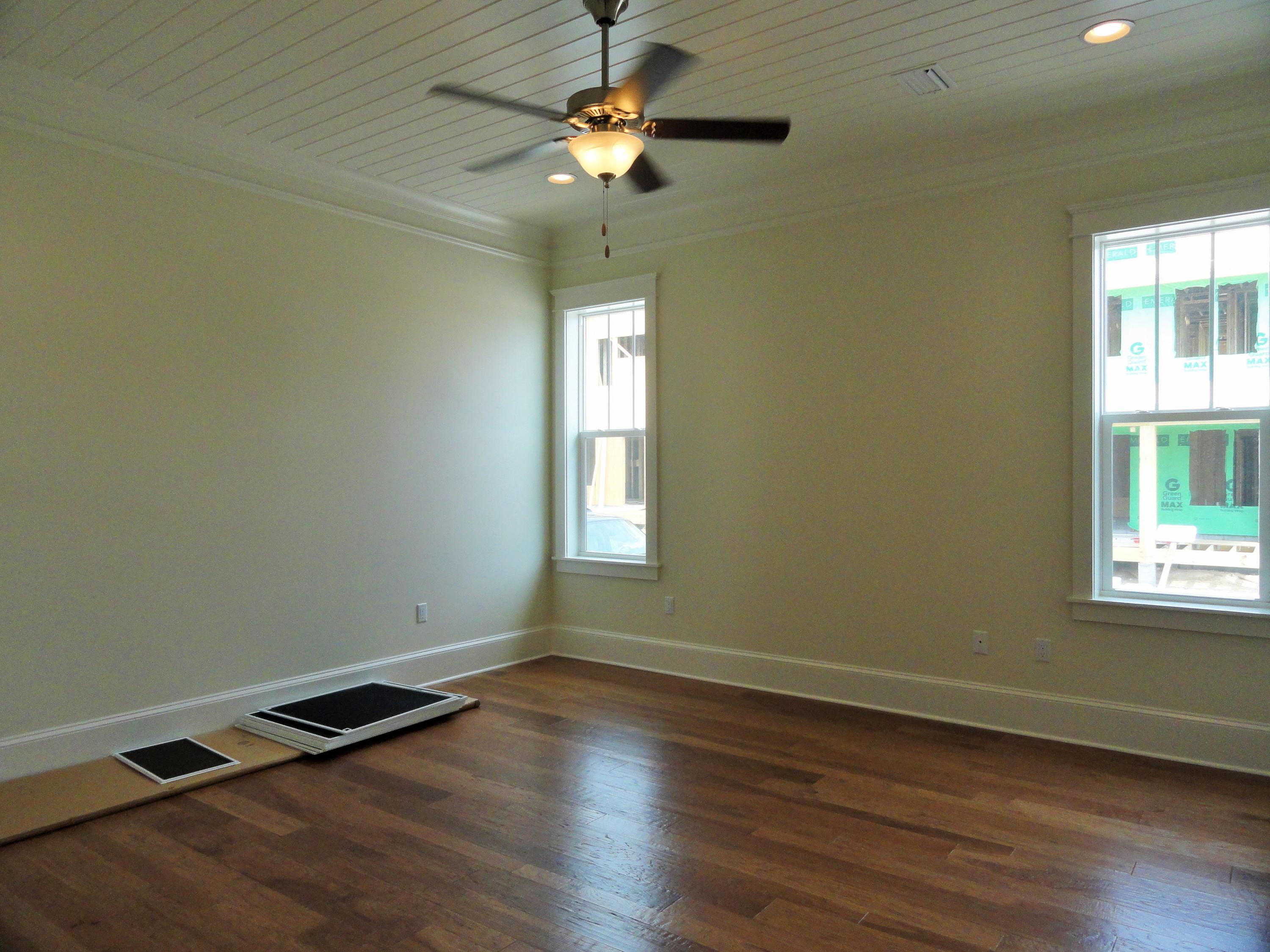 89 Clipper Street Inlet Beach, FL 32461 - Photo 20 of 50 a view of wooden floor and chandelier fan in a room