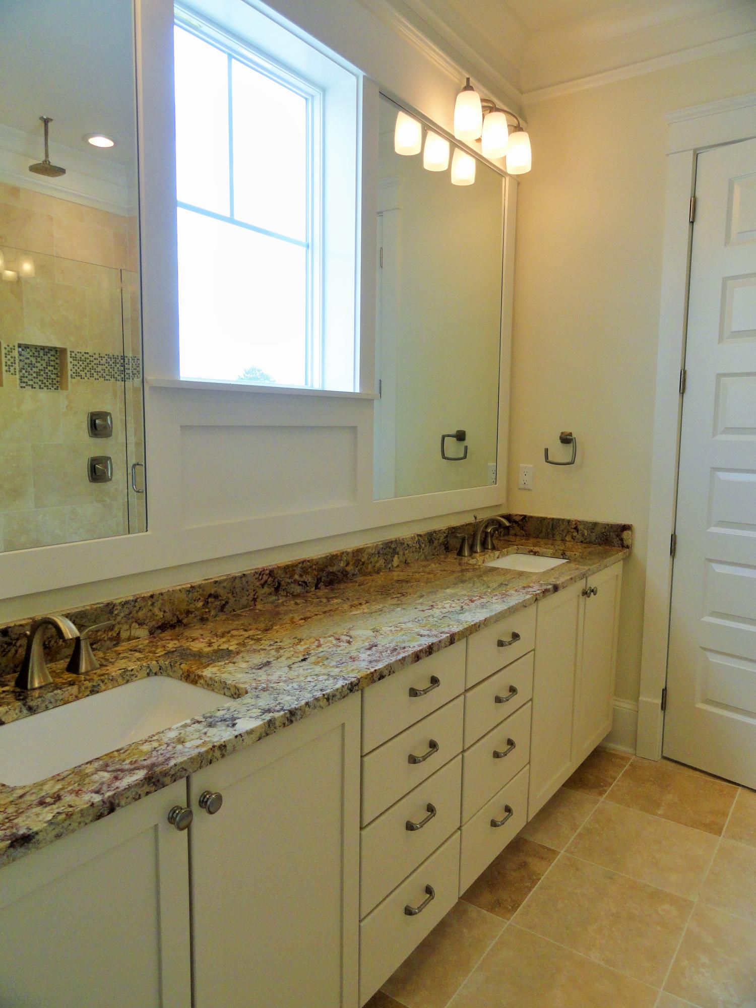 89 Clipper Street Inlet Beach, FL 32461 - Photo 23 of 50 a bathroom with a granite countertop sink and a mirror