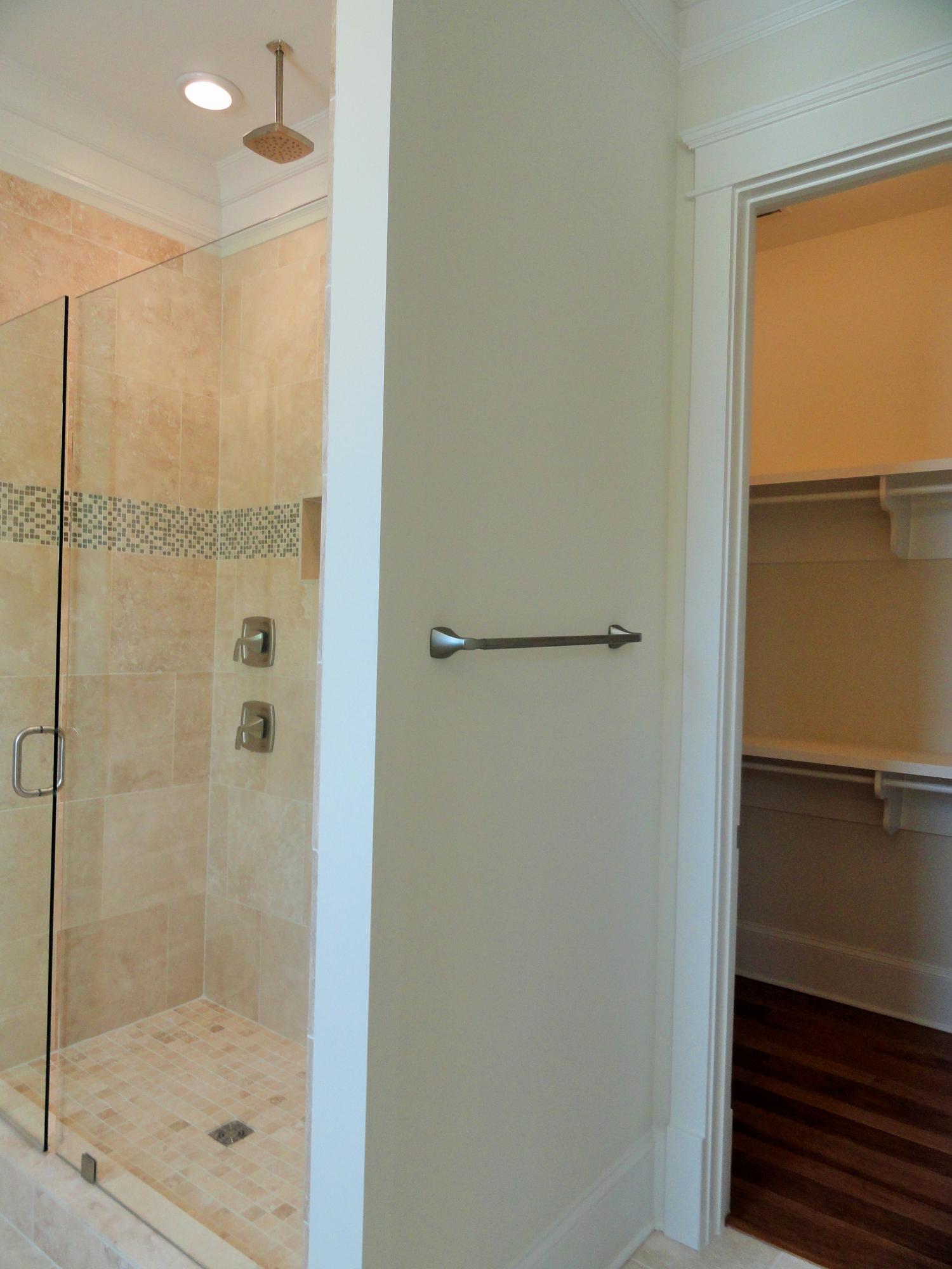89 Clipper Street Inlet Beach, FL 32461 - Photo 24 of 50 a bathroom with a glass shower door