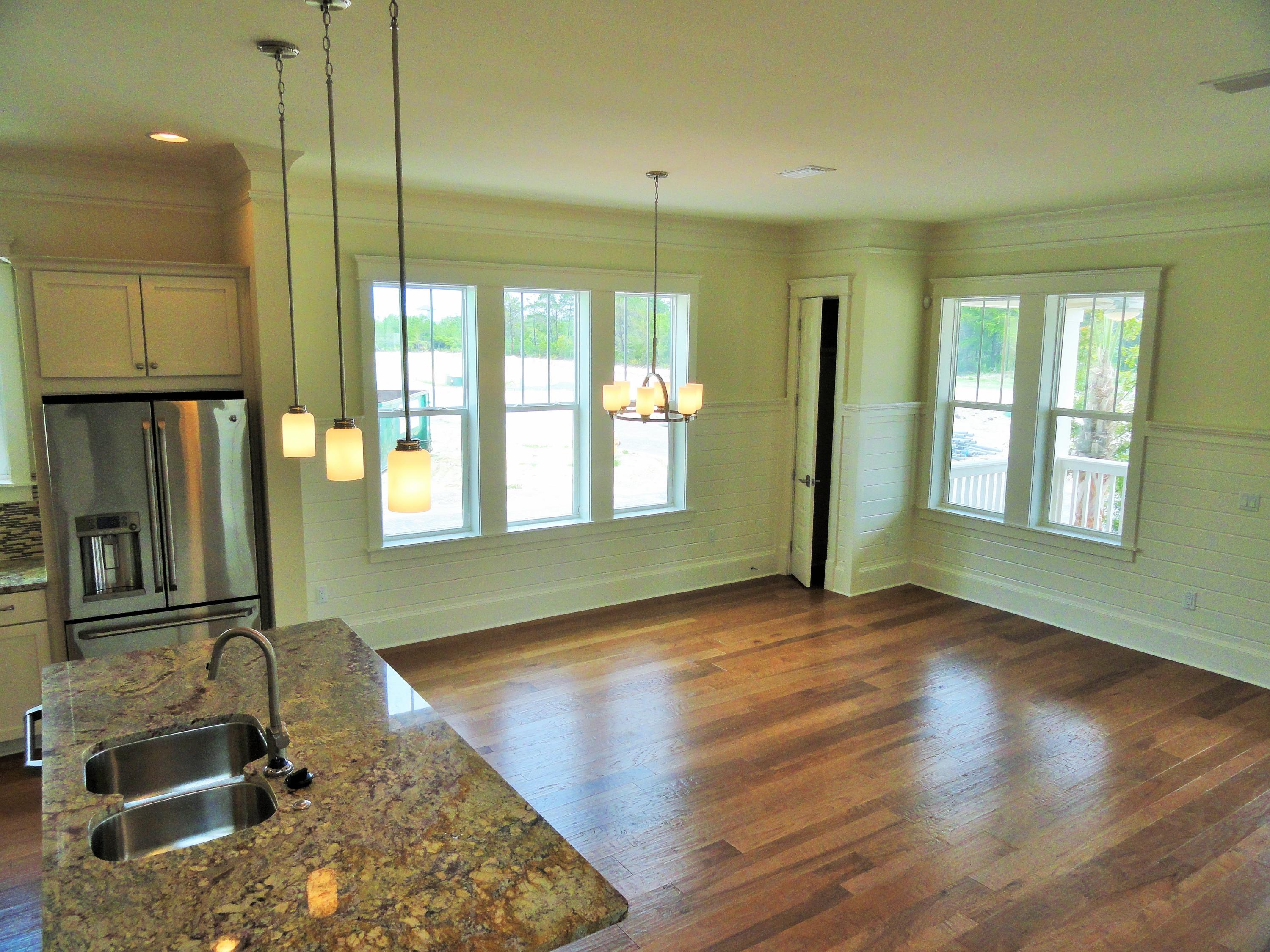 89 Clipper Street Inlet Beach, FL 32461 - Photo 30 of 50 a kitchen with sink and refrigerator