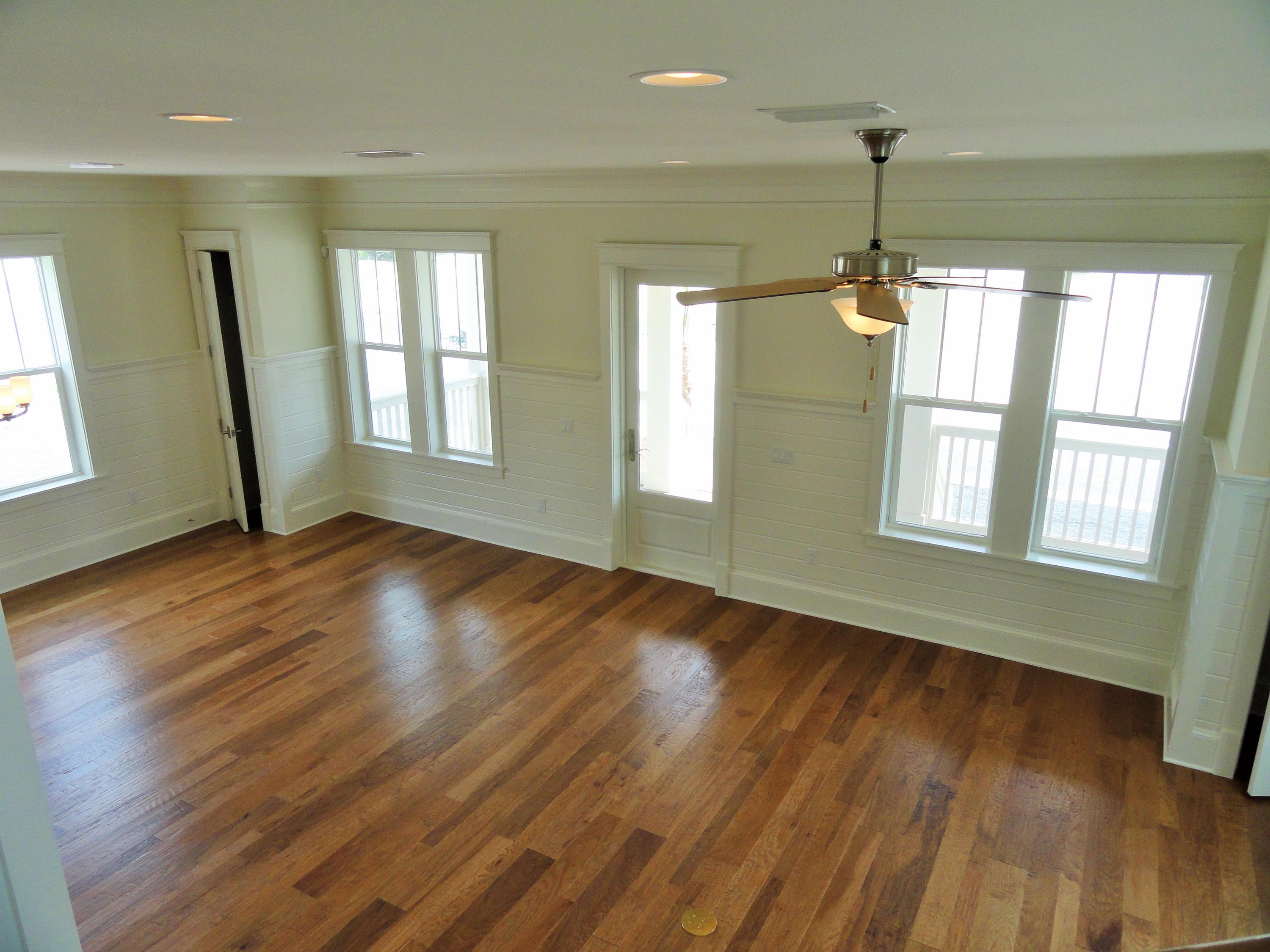 89 Clipper Street Inlet Beach, FL 32461 - Photo 31 of 50 a view of an empty room with glass door and wooden floor