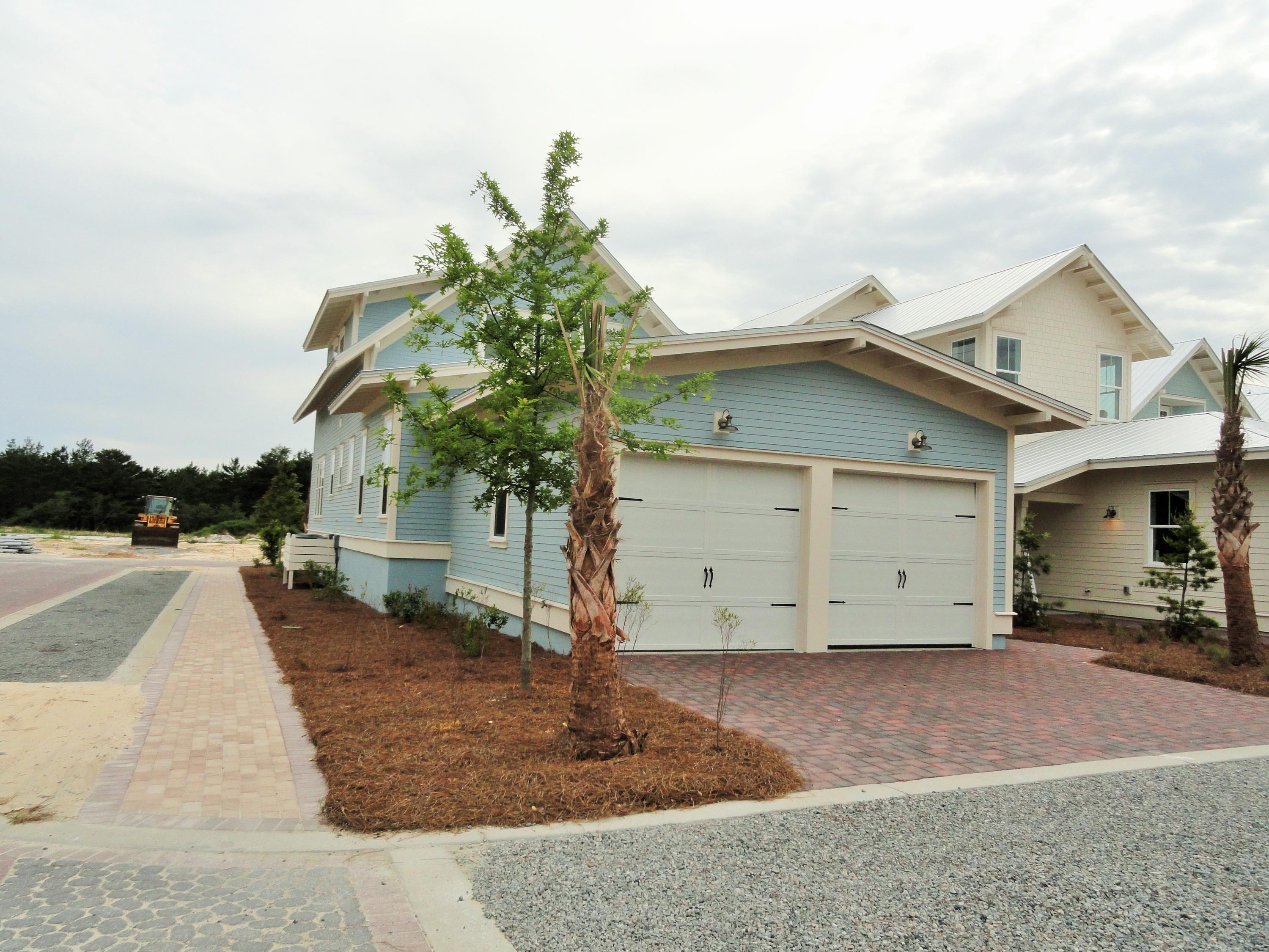 89 Clipper Street Inlet Beach, FL 32461 - Photo 7 of 50 a view of a house with a yard