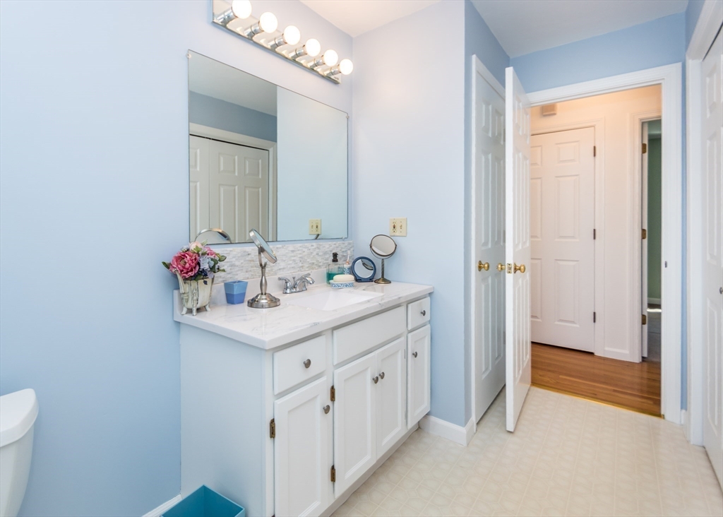 46 Timberline Road Millis, MA 02054 - Photo 22 of 38 a bathroom with a sink and a mirror