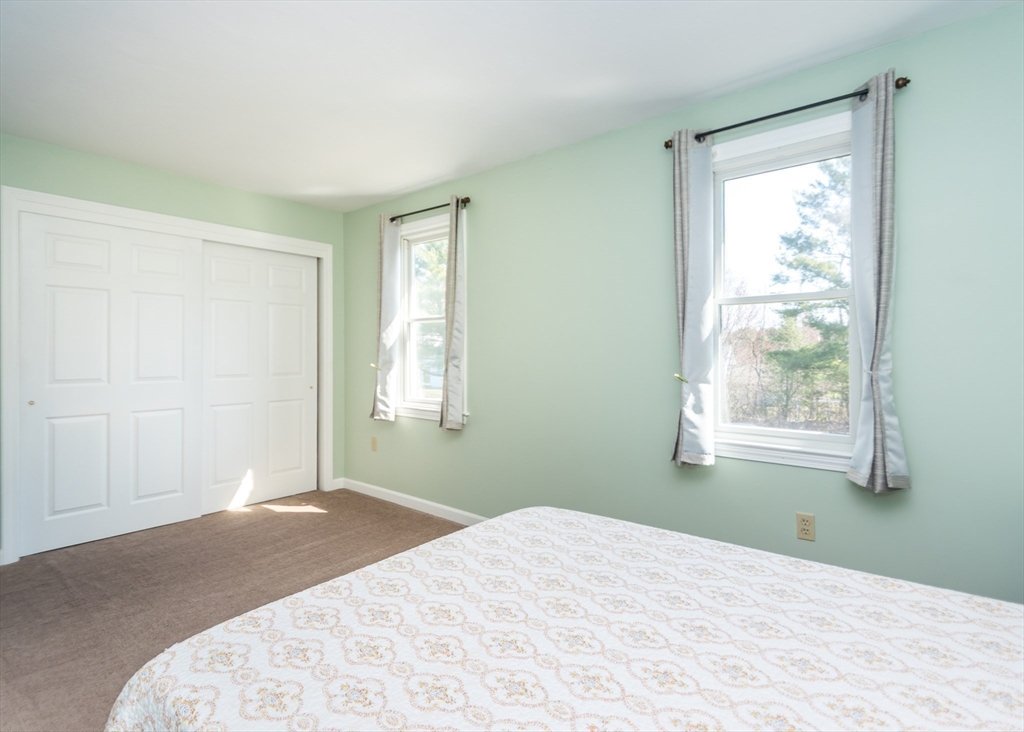 46 Timberline Road Millis, MA 02054 - Photo 27 of 38 a bedroom with a bed and a window