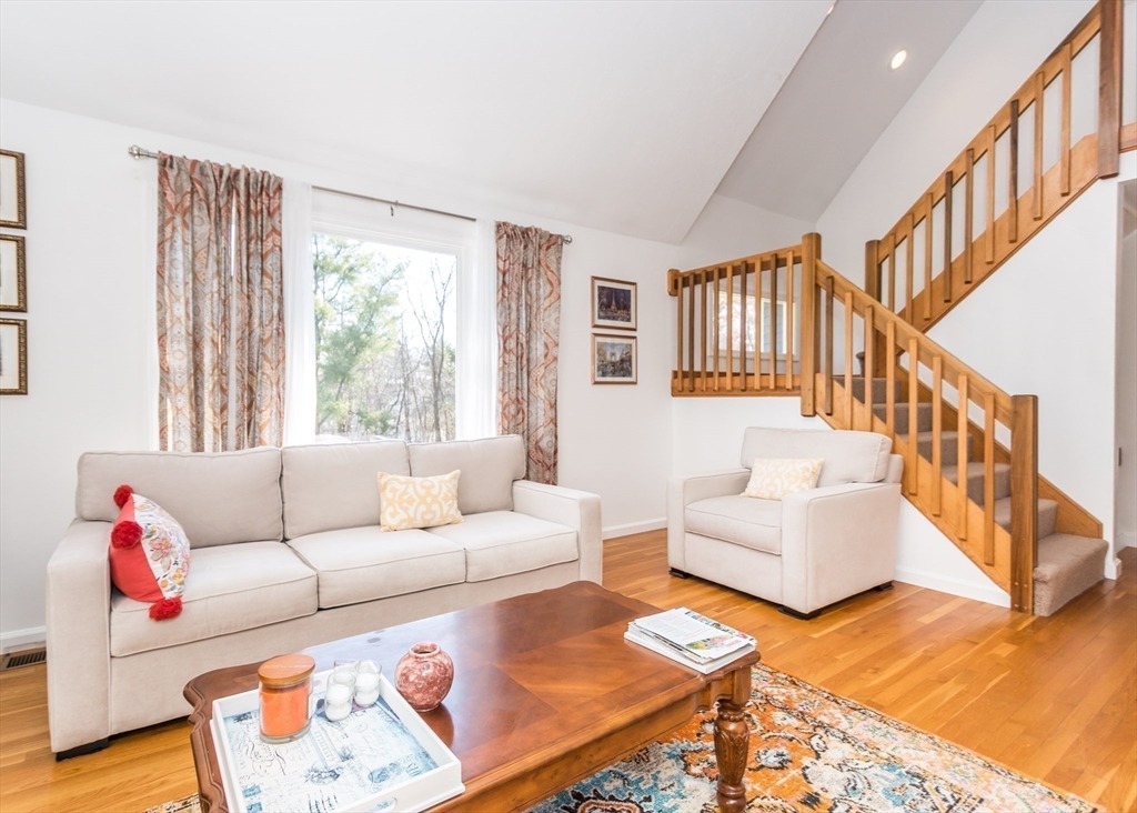 46 Timberline Road Millis, MA 02054 - Photo 3 of 38 a living room with furniture and a table with wooden floor