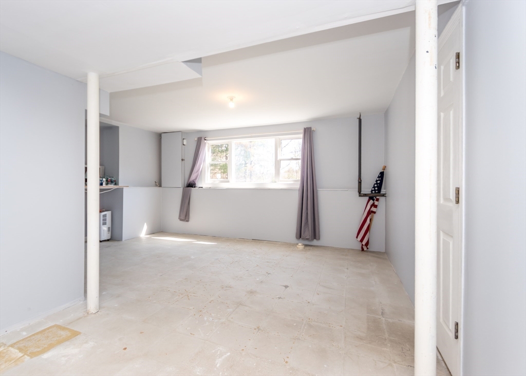 46 Timberline Road Millis, MA 02054 - Photo 31 of 38 a view of empty room with windows