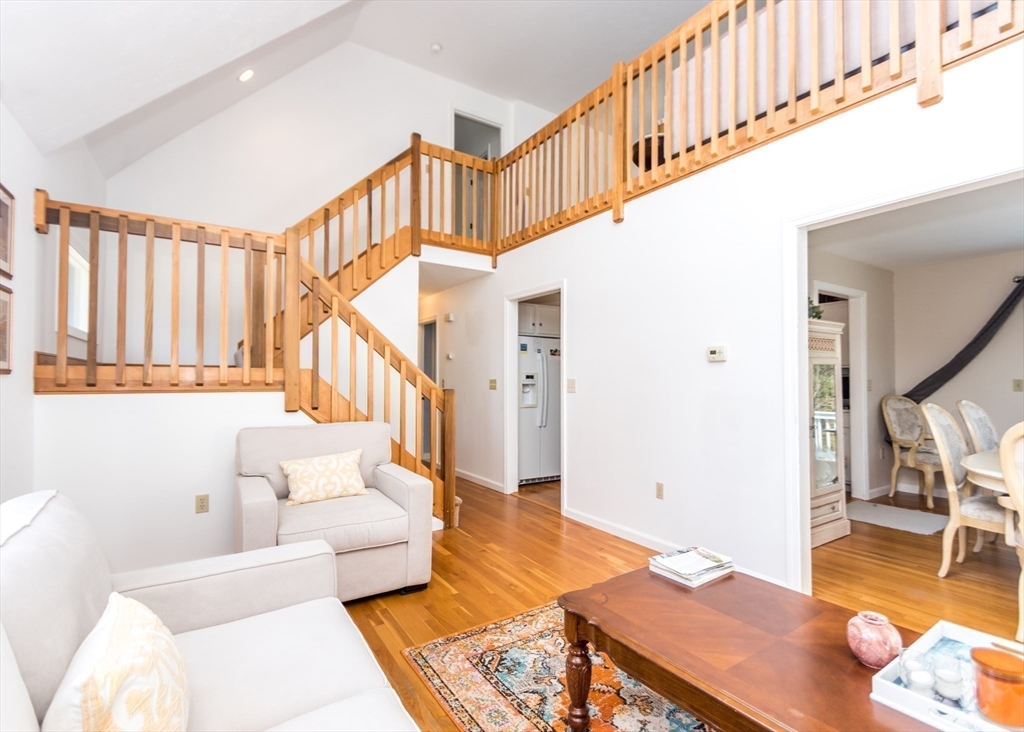 46 Timberline Road Millis, MA 02054 - Photo 4 of 38 a living room with furniture and stairs