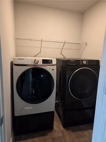 a utility room with dryer and washer