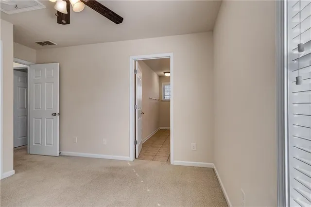 a bathroom with a sink a vanity and a window