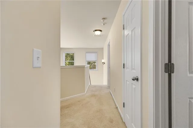 a white bath tub with a shower
