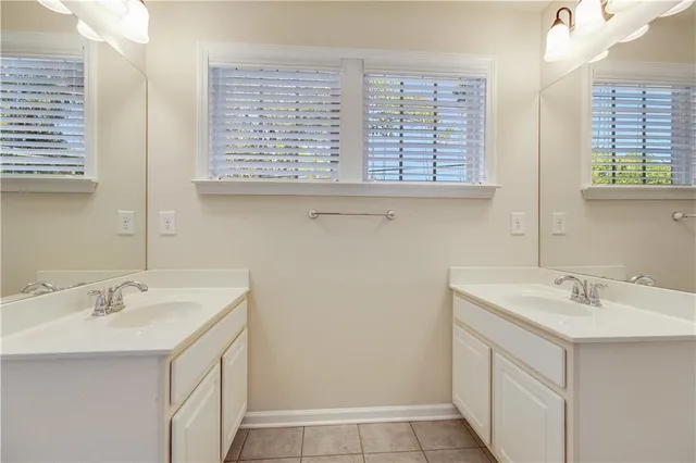 front view of a house with a garden