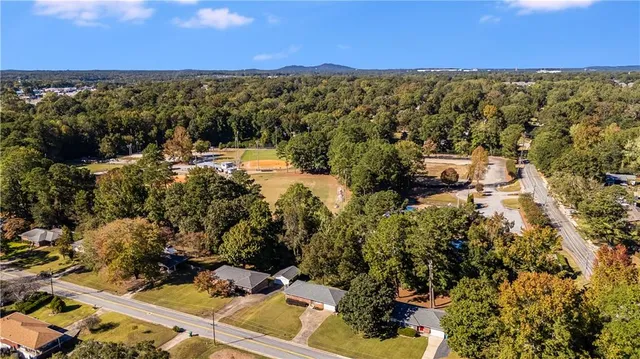 a house view with swimming pool