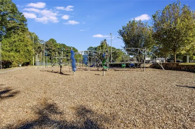 a view of a balcony with furniture