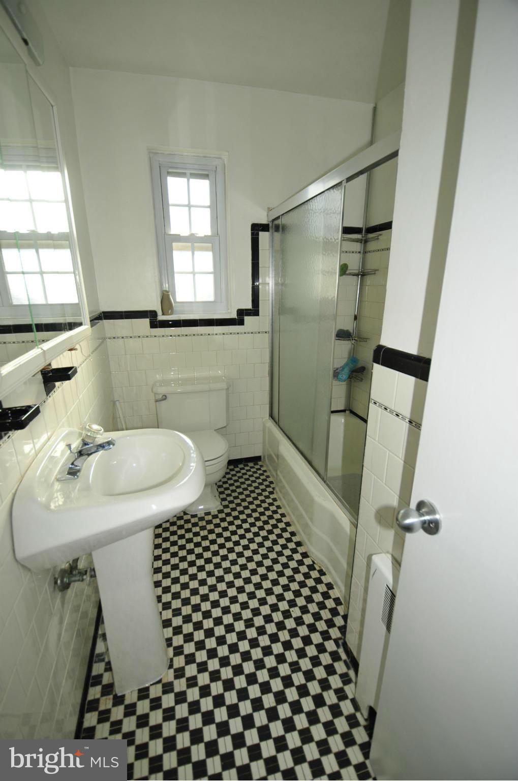 742 Weatherbee Road Towson, MD 21286 - Photo 22 of 24 a bathroom with a sink toilet and shower