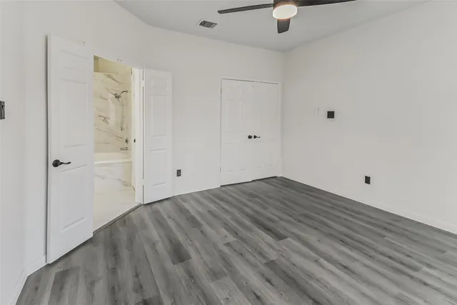 a view of a livingroom with wooden floor