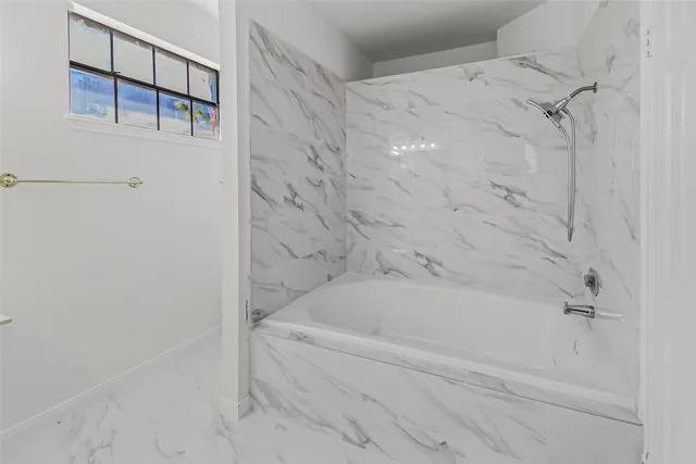 a bathroom with a bathtub