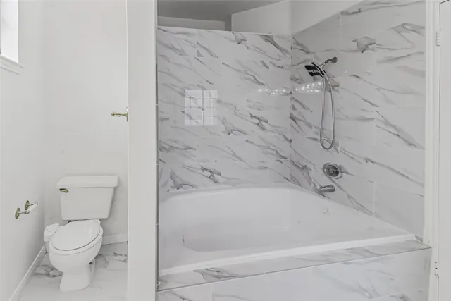 a close up of a bathtub in a bathroom