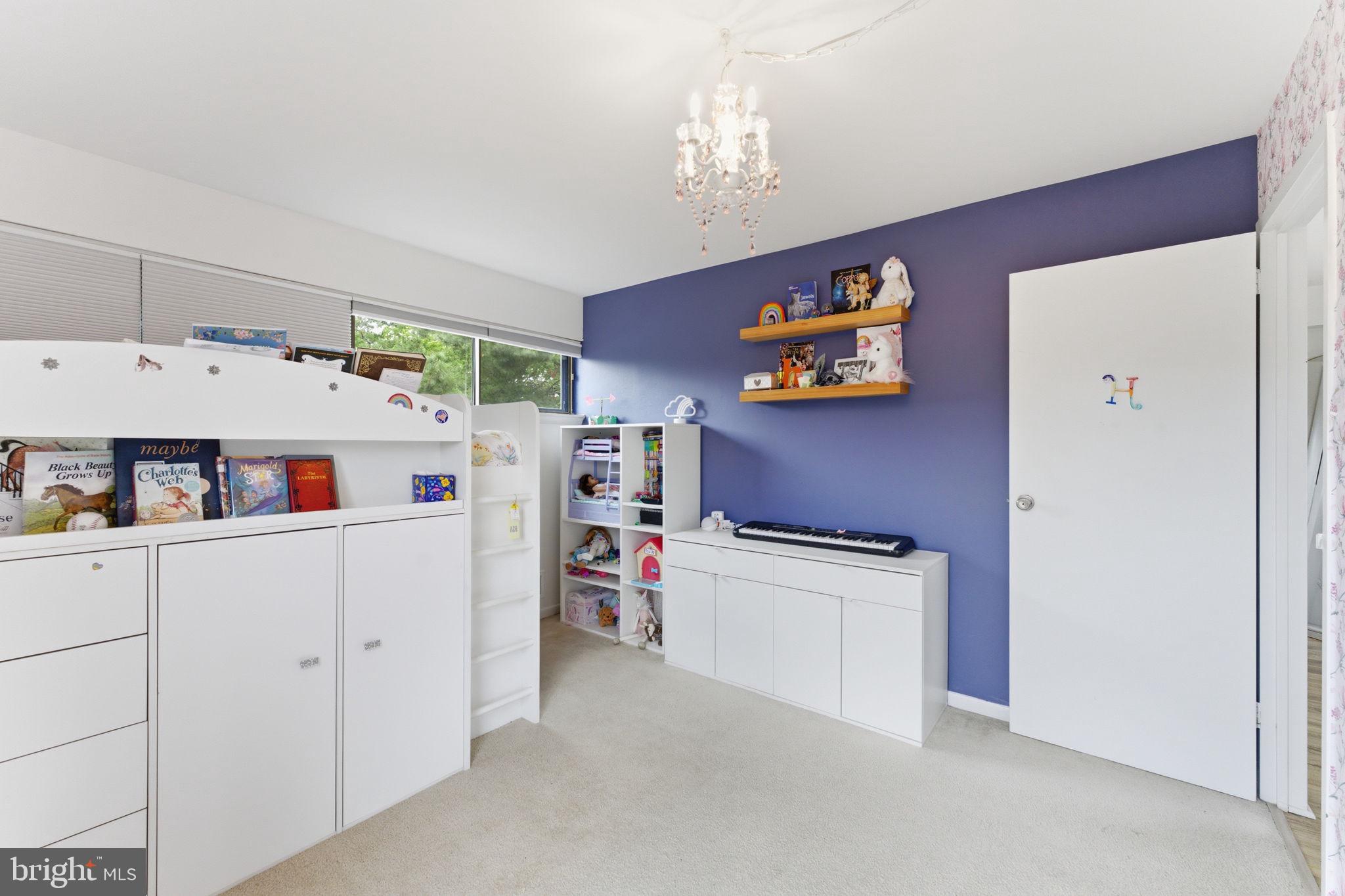 11260 Chestnut Grove Square, Unit 337 Reston, VA 20190 - Photo 50 of 82 Charming children's room with playful decor.