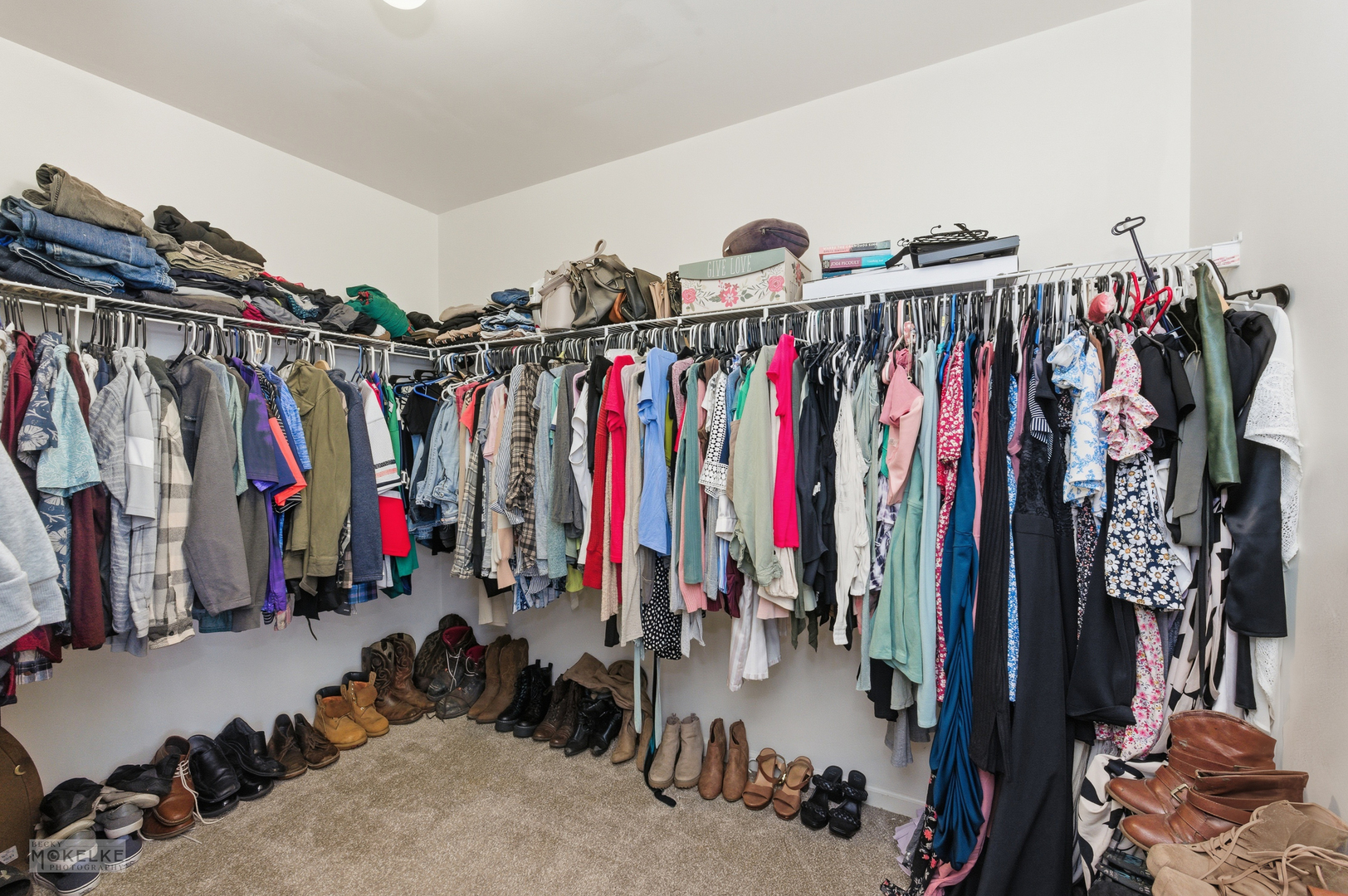 814 Edgewater Drive Minooka, IL 60447 - Photo 22 of 46 a view of walk in closet with clothes