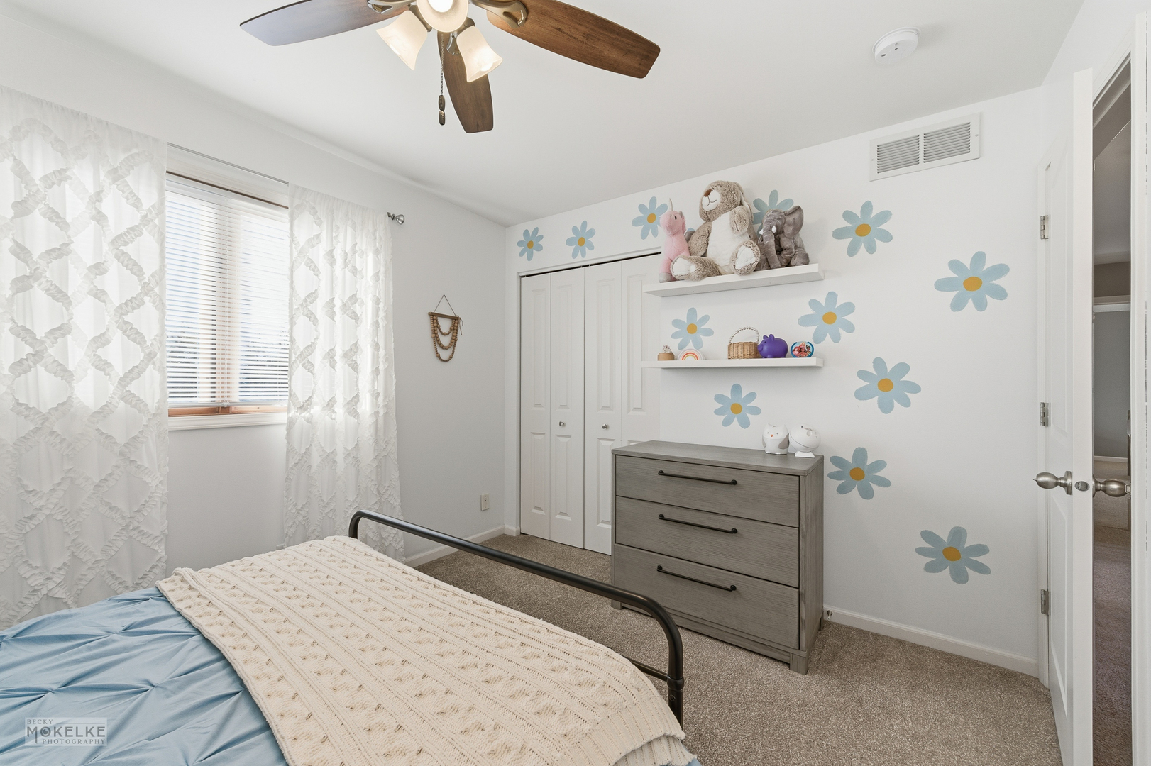 814 Edgewater Drive Minooka, IL 60447 - Photo 28 of 46 a bedroom with a bed and a window