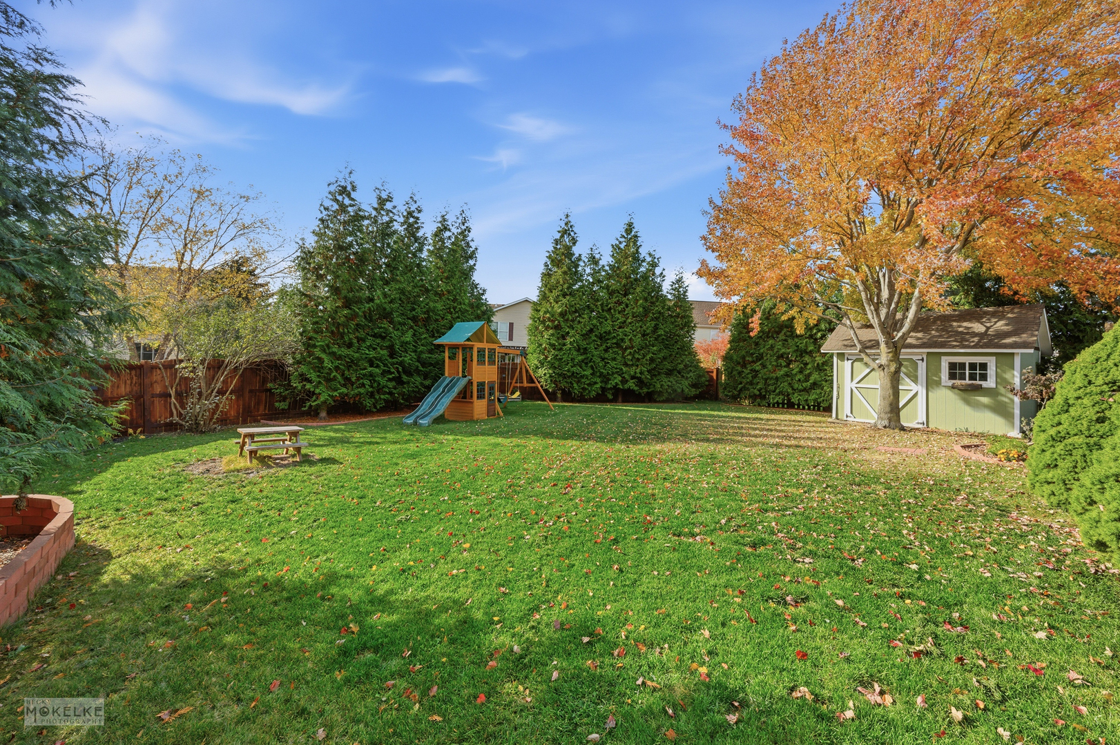 814 Edgewater Drive Minooka, IL 60447 - Photo 39 of 46 a view of a garden with a slide
