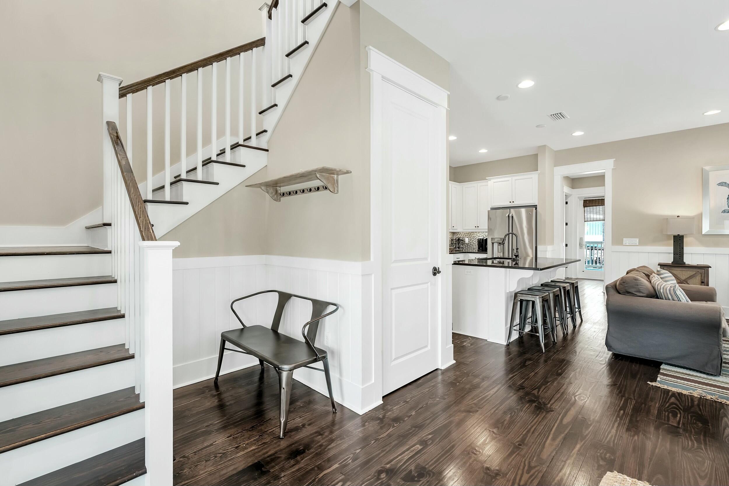 673 Flatwoods Forest Loop Santa Rosa Beach, FL 32459 - Photo 13 of 41 a living room with furniture and a dining table with wooden floor