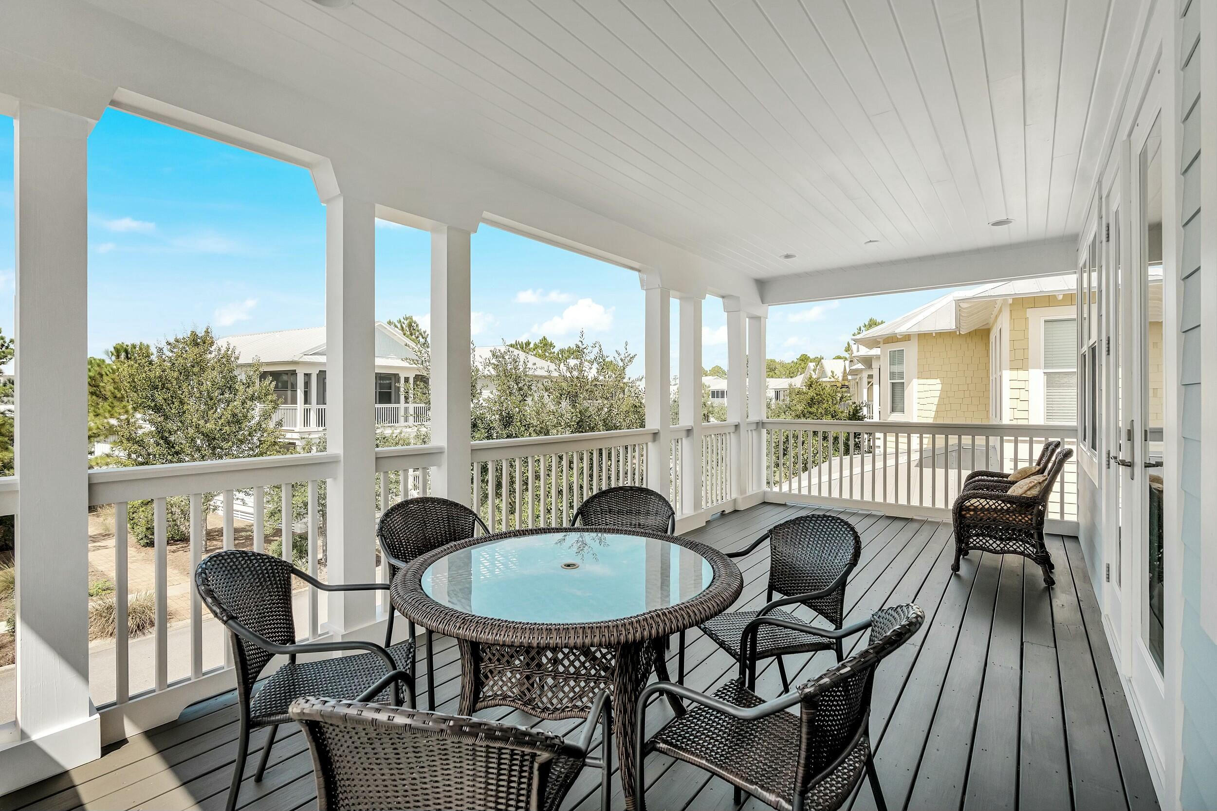 673 Flatwoods Forest Loop Santa Rosa Beach, FL 32459 - Photo 17 of 41 a view of a city from a dining room with furniture window and wooden floor