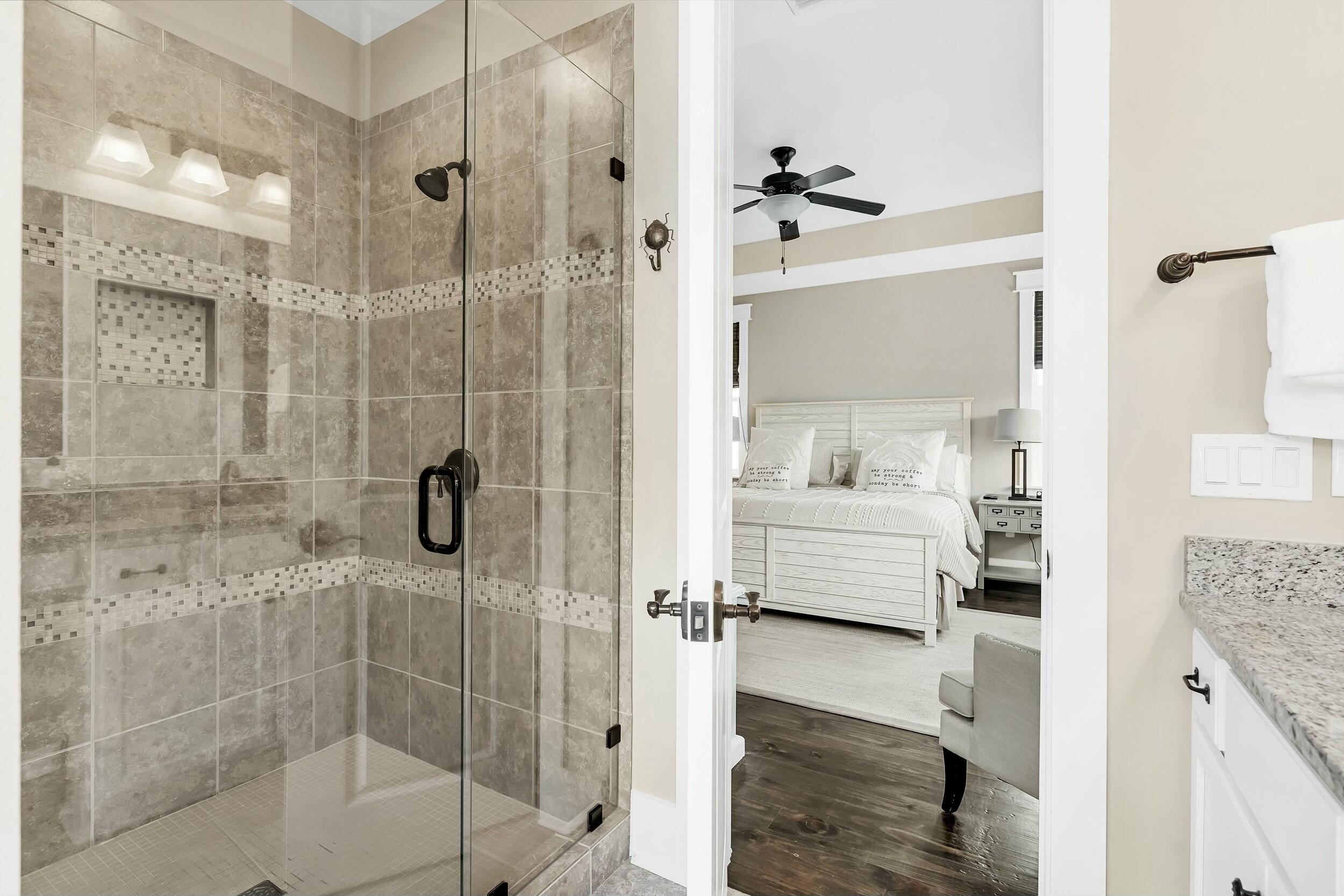 673 Flatwoods Forest Loop Santa Rosa Beach, FL 32459 - Photo 21 of 41 a bathroom with a shower and a sink