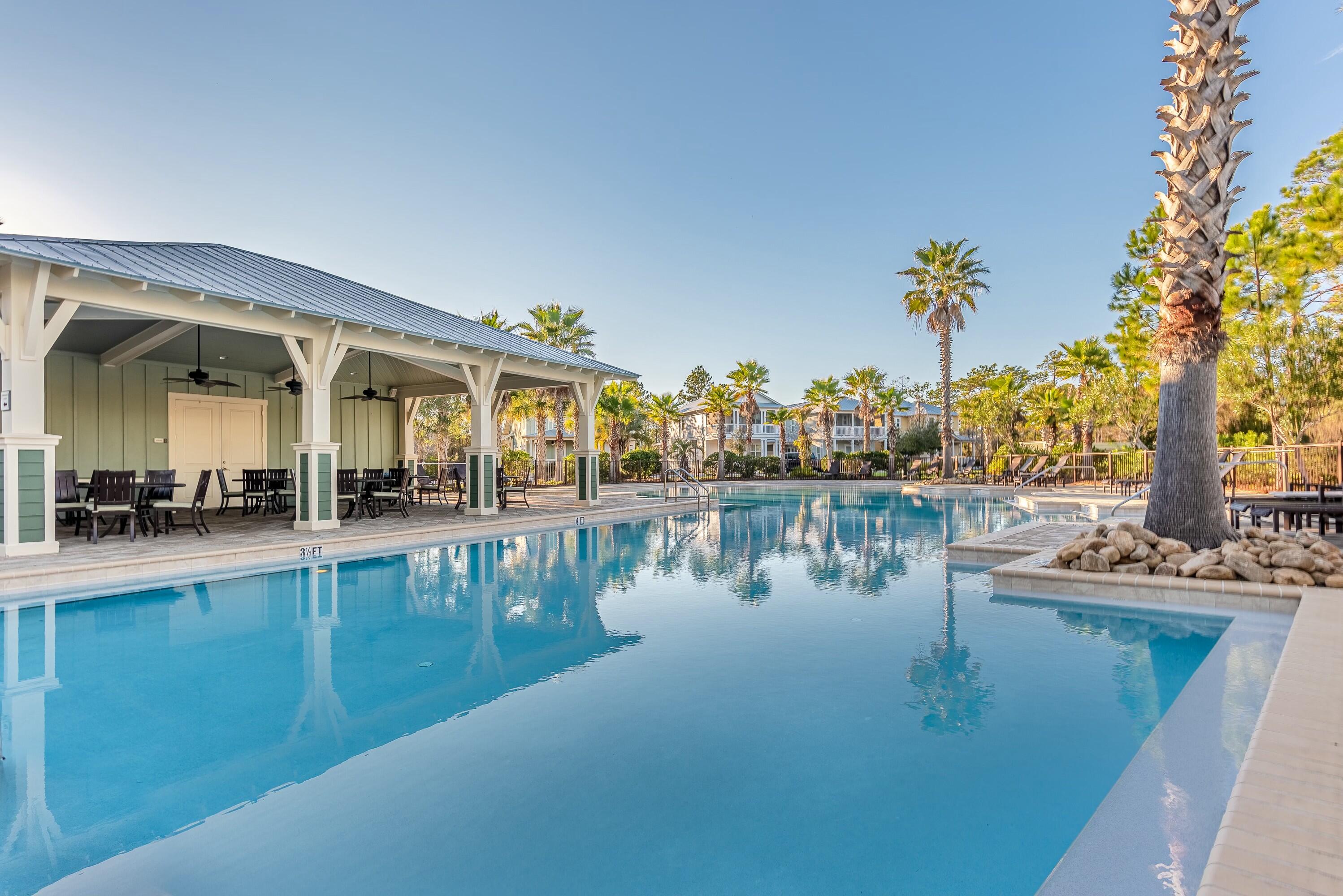673 Flatwoods Forest Loop Santa Rosa Beach, FL 32459 - Photo 32 of 41 a view of a swimming pool with outdoor seating