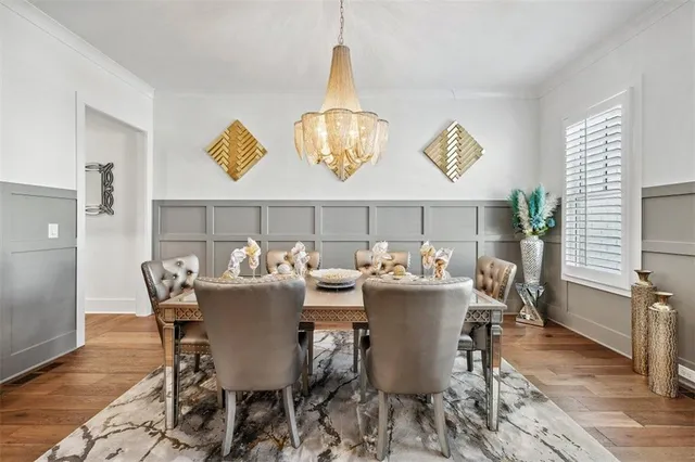 a spacious bathroom with a shower sink and mirror