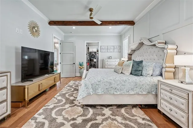 a bathroom with a granite countertop sink toilet and a mirror