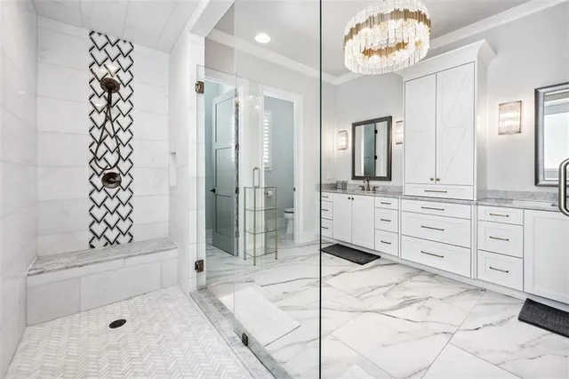 a living room with furniture large window and a flat screen tv