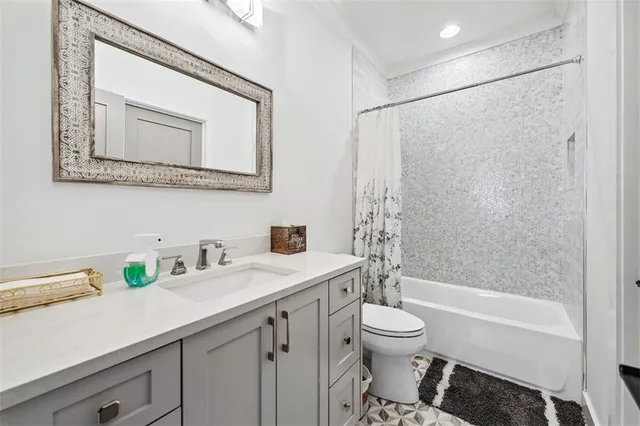 a view of a patio with couches chairs and a fire pit