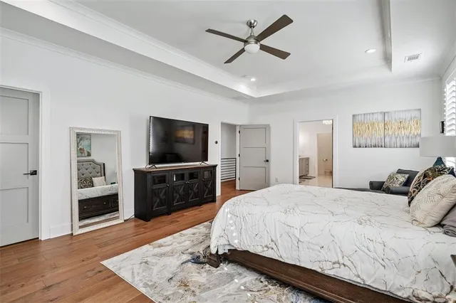 a front view of a house with a yard outdoor seating and garage