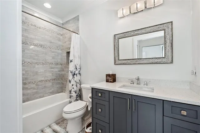 a front view of a house with a yard table and chairs