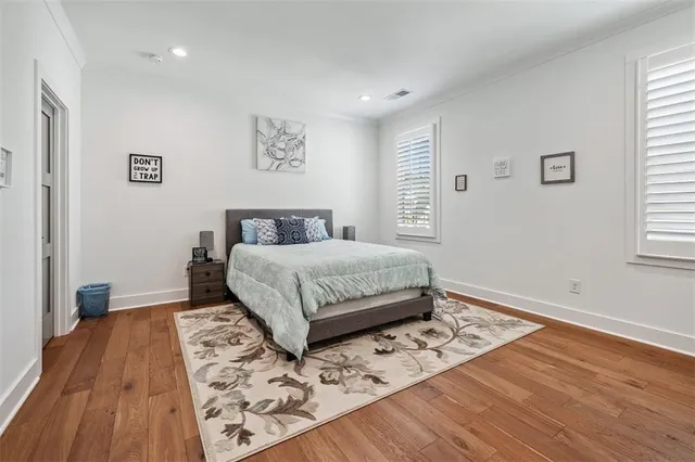 a view of a house with a yard and garden