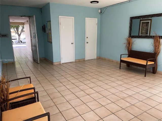 a view of a backyard with palm trees