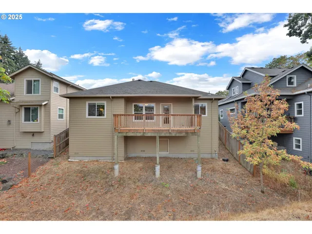 a view of balcony with wooden floor
