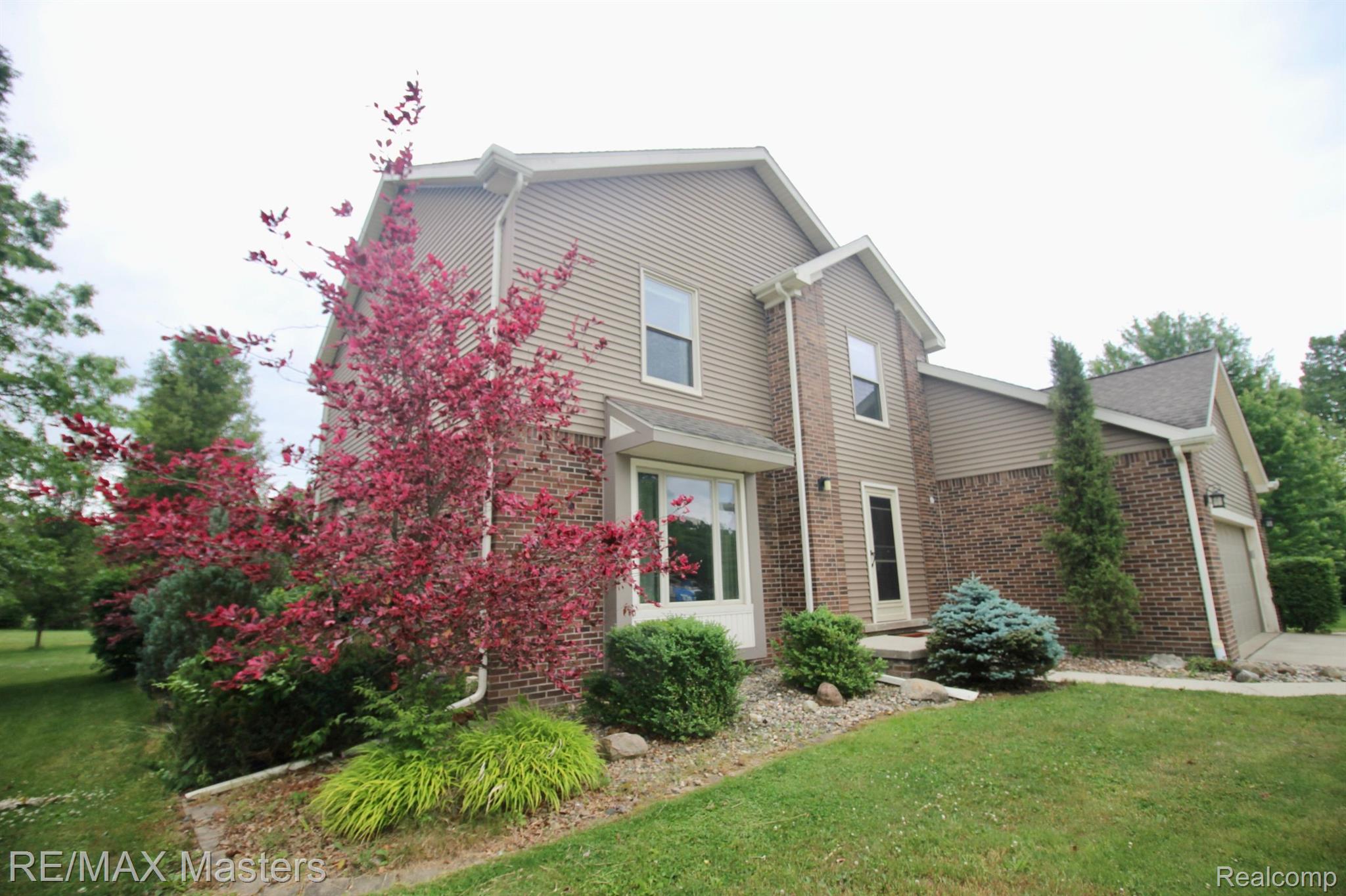 Beautiful landscaping, trees planted by sellers.