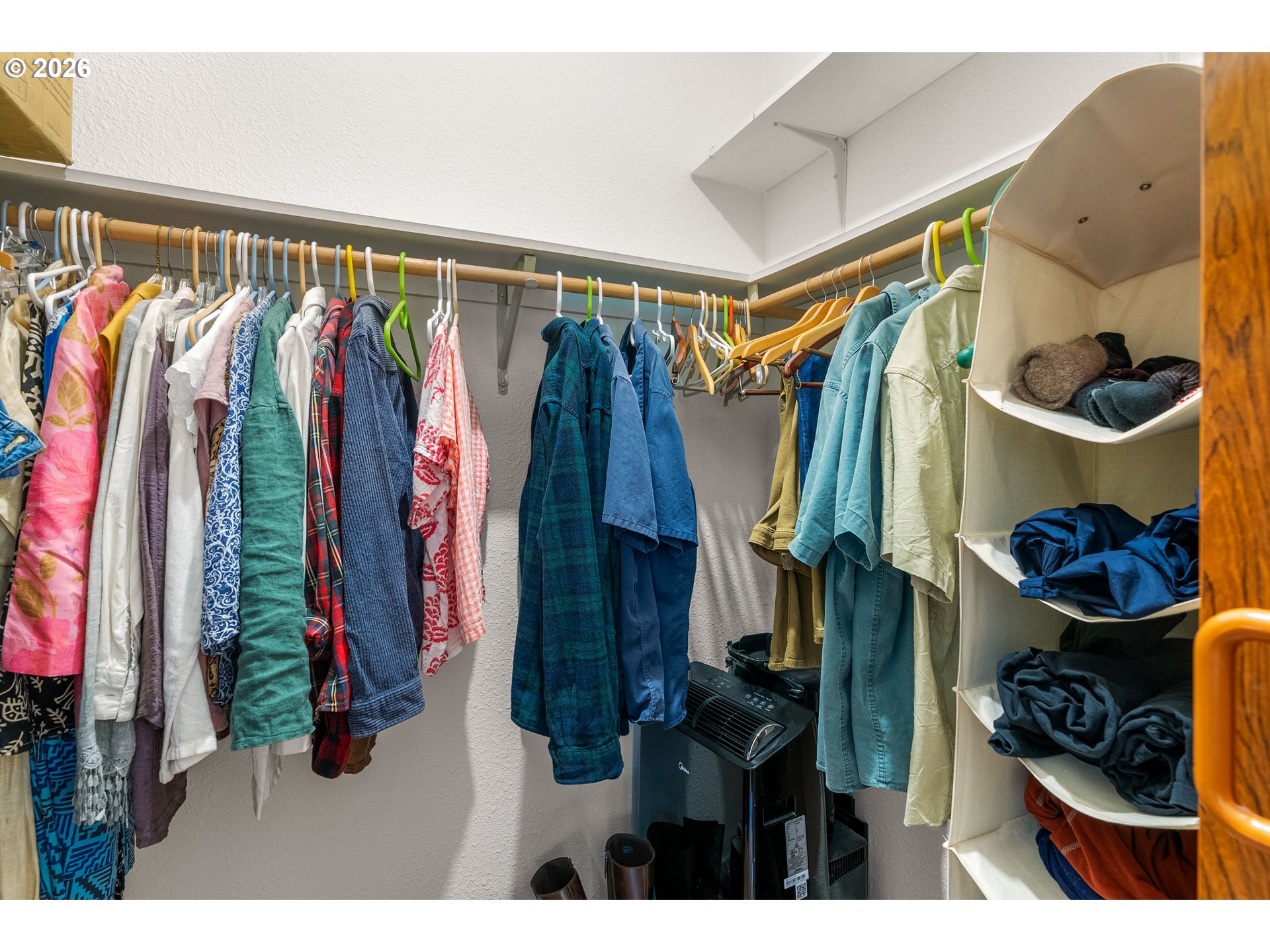 451 Cannavinna Road Carson, WA 98610 - Photo 17 of 33 a view of walk in closet with clothes and shoes