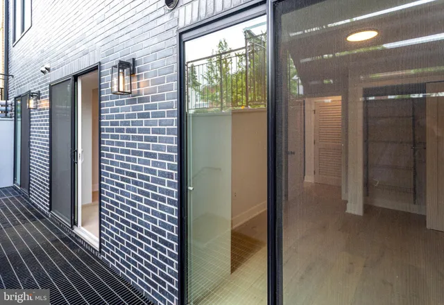 a view of balcony with wooden floor