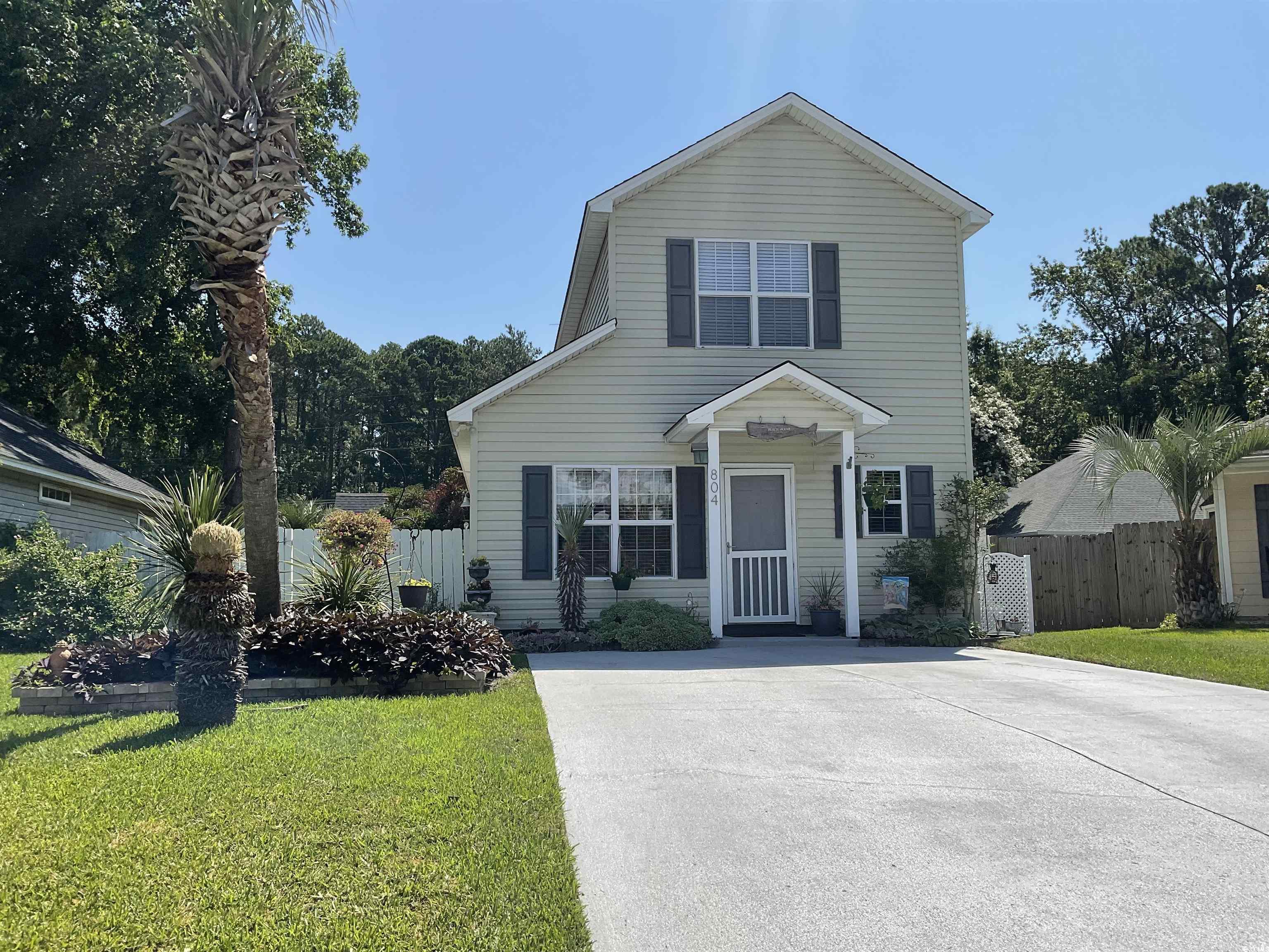 804 Brenda Place Myrtle Beach, SC 29577 - Photo 3 of 39 View of front facade featuring concrete driveway