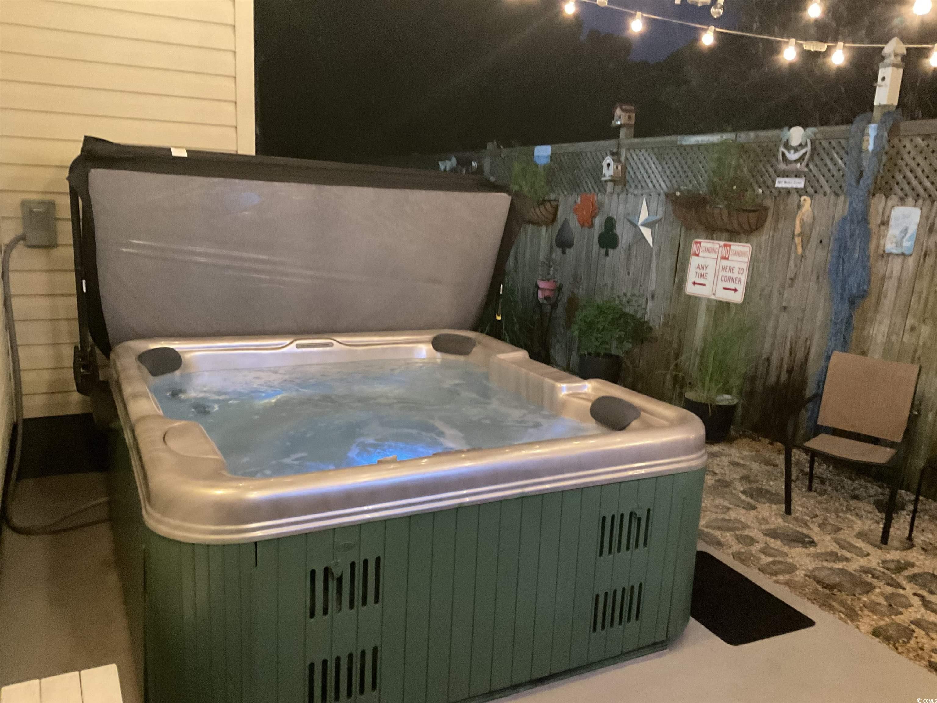 804 Brenda Place Myrtle Beach, SC 29577 - Photo 34 of 39 View of patio featuring a hot tub